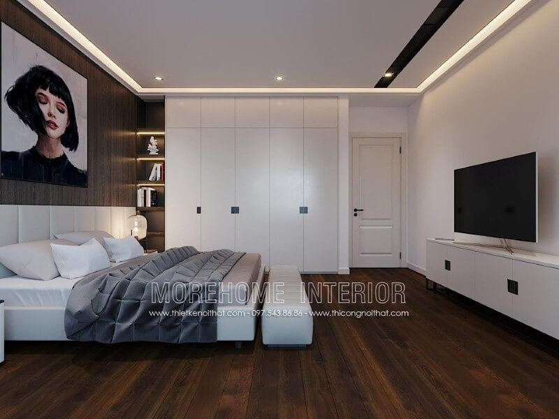 Bố trí nội thất phòng ngủ ấn tượng với tủ quần áo sơn trắng kết hợp kệ trang trí sát giường ngủ. Thiết kế chung cư