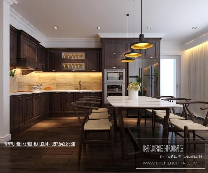 Tủ bếp chung cư ấn tượng với tone màu trầm mang lại từ gỗ óc chó cao cấp, ngoài ra còn khéo léo lồng ghép các thiết bị gia dụng nhà bếp hiện đại giúp cho những người nội trợ dễ dàng chế biết mang lại cho người yêu thương của mình những món ăn ngon miệng Tủ bếp gỗ, tủ bếp gỗ tự nhiên, tủ bếp tân cổ điển