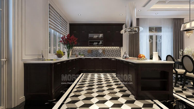 Hệ thống tủ bếp bằng gỗ tự nhiên màu đen kết hợp với màu trắng của tường nhà và kính ốp bếp mang lại một không gian nhà bếp sang chảnh. Đảo bếp được thiết kế như một chiếc bàn đa năng để giúp bà nội trợ thỏa thích trưng bày đồ ăn và thỏa sức trổ tài nội trợ. Tủ bếp đẹp, tủ bếp đẹp hiện đại, tủ bếp An Cường, tủ bếp cao cấp